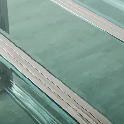 Titus Stainless Steel Dining Table - Smoke Green Glass Top