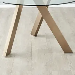 Jutta Glass 120cm Dining Table - Antique Brass Colour Legs